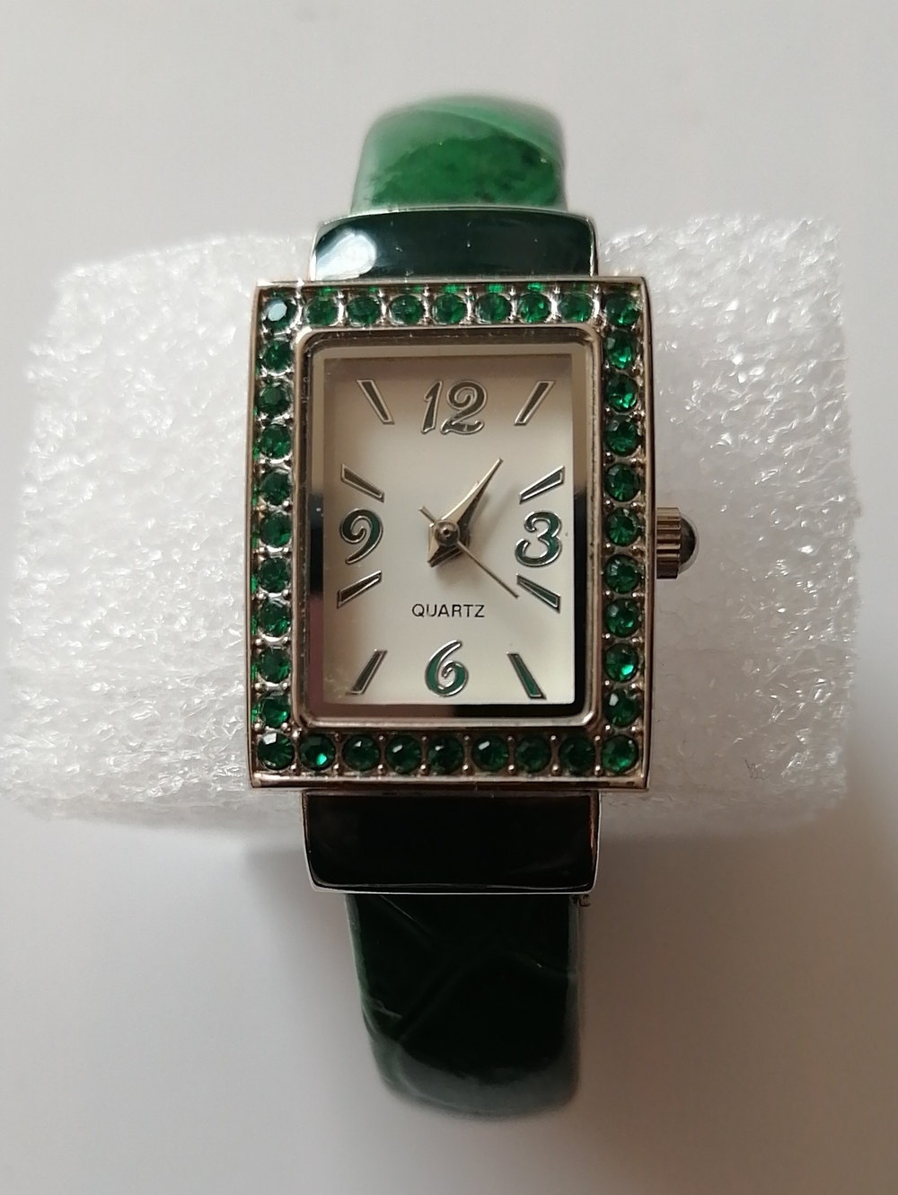 Avon Analog Wristwatch Quartz Silvertone Hinged Cuff Pave Bezel Green Crystals